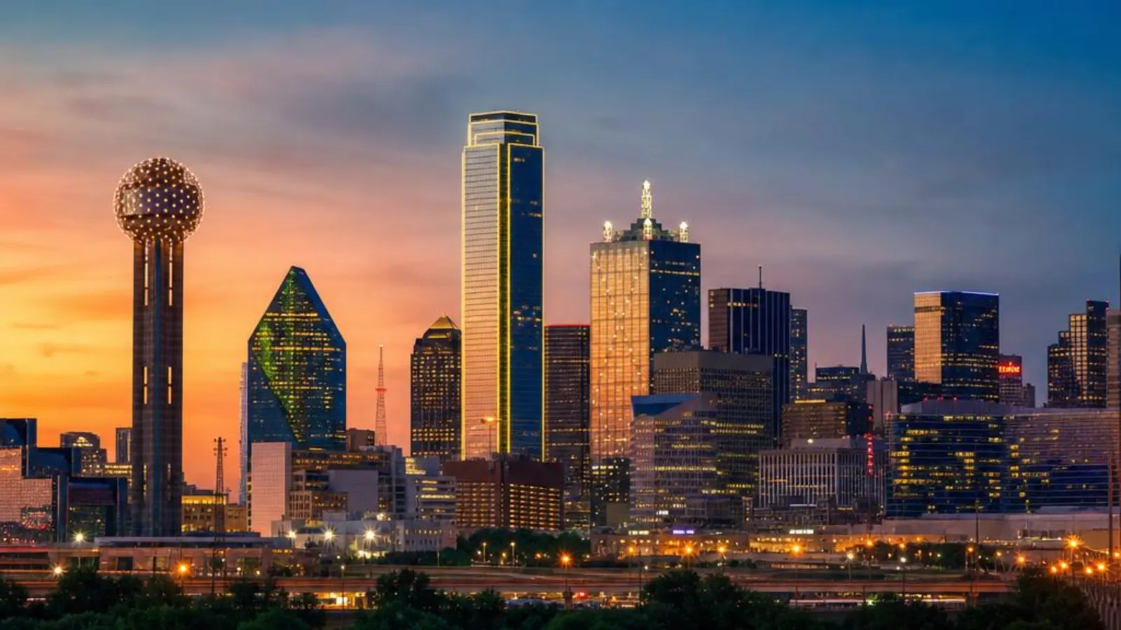 The Dallas skyline at dusk across the Dallas–Fort Worth metroplex